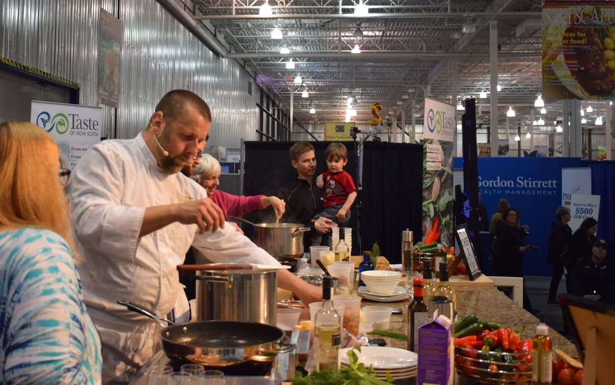 Fox Harb'r Resort Chef Shane Robilliard making chowder on the Taste of Nova Scotia stage Saltscapes Expo